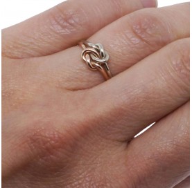 Gold Double love knot ring on hand by TDN Creations