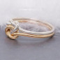 Gold and silver double love knot ring