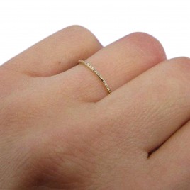 Skinny  gold stack ring textured with small lines