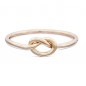 Solid gold love knot ring