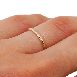 Solid gold stack ring patterned with small dots