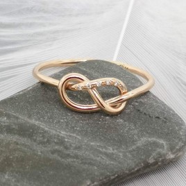 Figure 8 knot ring with tiny diamonds