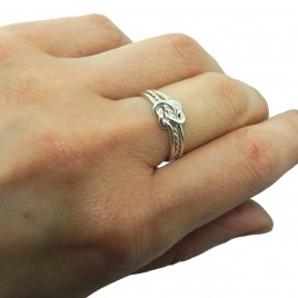 Double love knot ring with twisted center band