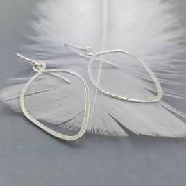 Pair of minimalist leaf earrings in sterling silver