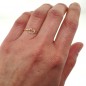 Love knot ring in sterling silver or gold-filled with rope texture