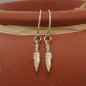 Solid gold feather dangle earrings