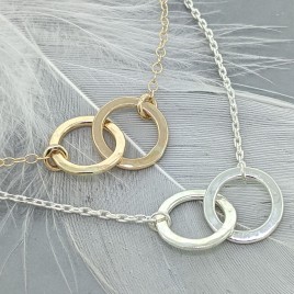 You and Me circle karma necklace in silver or gold-filled