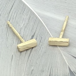 Tiny edgy bar stud earrings in gold