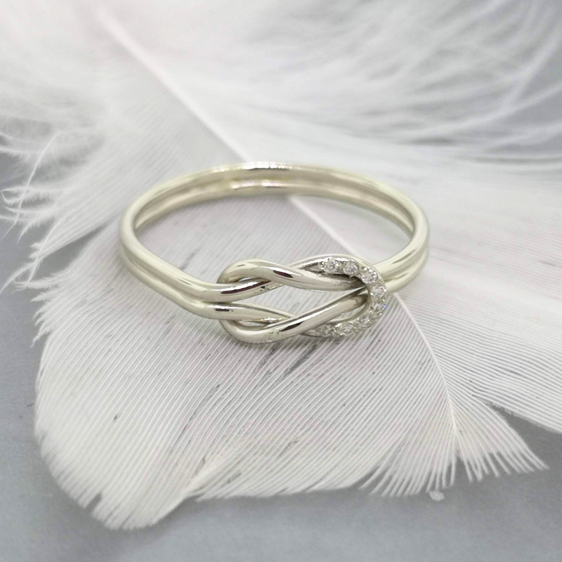 gold-hug-knot-ring-with-8-tiny-diamonds (2).jpg