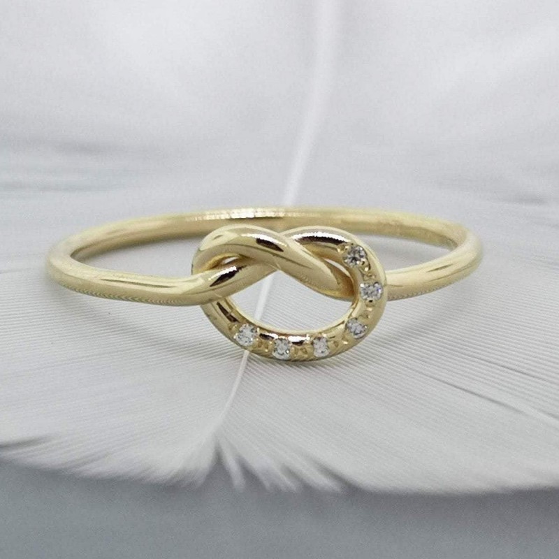 solid-gold-love-knot-ring-with-tiny-diamonds.jpg
